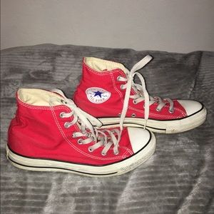 Red high top converse shoes